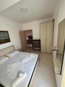 Postel nebo postele na pokoji v ubytování Al Mare Apartments