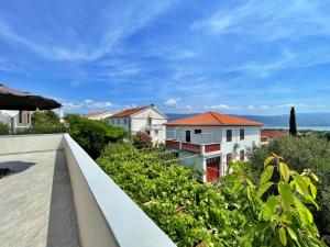 a view from the balcony of a house at Apartments with parking space Silo, Krk - 18757 in Šilo