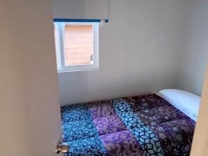 Postel nebo postele na pokoji v ubytování Hermosa Casa