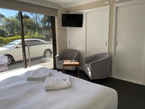 Postel nebo postele na pokoji v ubytování Huskisson Beach Escape