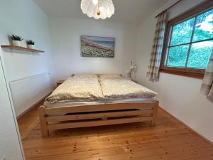 Posteľ alebo postele v izbe v ubytovaní Ferienhaus Stiglitzweg