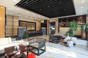 杭州东站汇和君亭酒店 - 免费自助洗衣的休息区