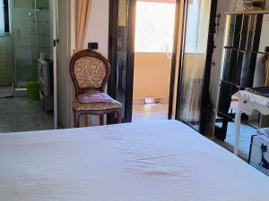 Cama ou camas em um quarto em B&B Is Pranus a Mari Casa Privata
