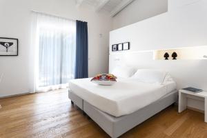 Postel nebo postele na pokoji v ubytování Calapetra Resort