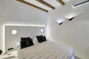 Voodi või voodid majutusasutuse Ios Resort toas