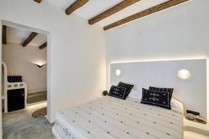 Voodi või voodid majutusasutuse Ios Resort toas