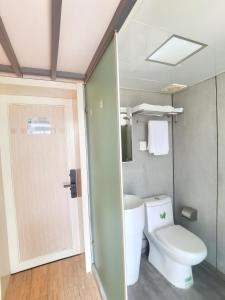Vannituba majutusasutuses Yue Lv Hotel