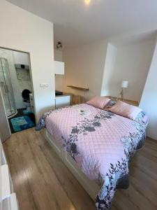 Posteľ alebo postele v izbe v ubytovaní Apartmán Kostomlaty pod Milešovkou