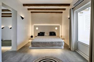Voodi või voodid majutusasutuse Ios Resort toas