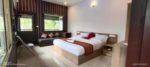 Letto o letti in una camera di Wildside Wayanad