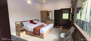 Letto o letti in una camera di Wildside Wayanad