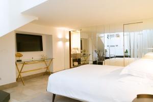 Posteľ alebo postele v izbe v ubytovaní Villa Marina Capri
