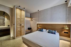 Voodi või voodid majutusasutuse Ios Resort toas