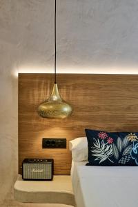 Voodi või voodid majutusasutuse Ios Resort toas