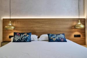 Voodi või voodid majutusasutuse Ios Resort toas