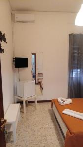 A television and/or entertainment centre at B&B RESTO AL SUD