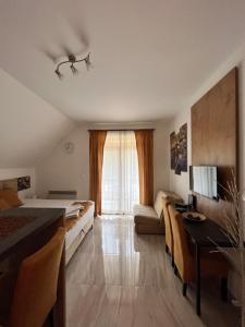 TV a/nebo společenská místnost v ubytování Apartman Pavle