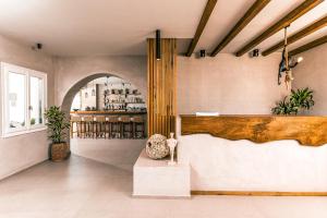 Voodi või voodid majutusasutuse Ios Resort toas