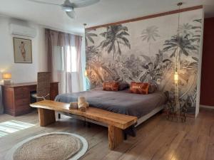 Postel nebo postele na pokoji v ubytování Villa mimosa