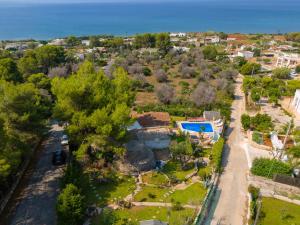 an aerial view of a villa with a resort at Villa Paiare in Torre Vado