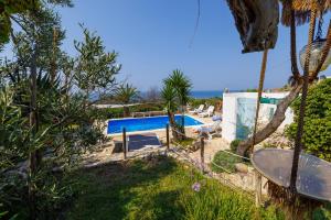 a view of the pool from the house at Villa Paiare in Torre Vado +75 photos