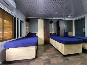 Postel nebo postele na pokoji v ubytování ZEST STAYS 1054-ANDHERI WEST