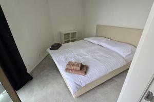 Posteľ alebo postele v izbe v ubytovaní Air conditioned 2 room Apartment Vienna Gate, 4