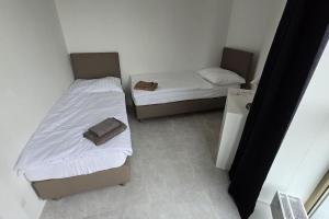 Posteľ alebo postele v izbe v ubytovaní Air conditioned 2 room Apartment Vienna Gate, 4