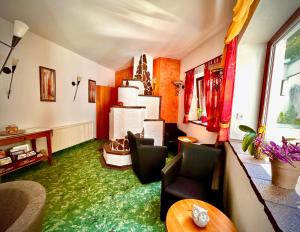 Χώρος καθιστικού στο Das WALDFRIEDE Appartement