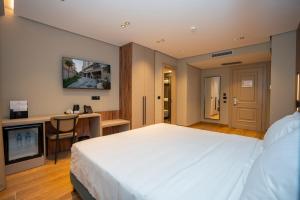 Ліжко або ліжка в номері Hotel Mozart