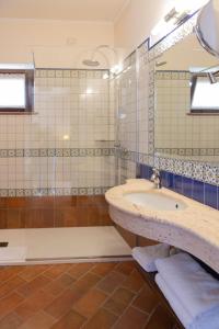 Vannituba majutusasutuses SarAnd Relais-Adults Only