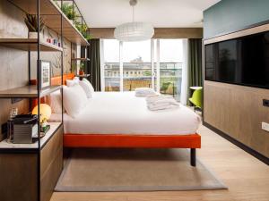 Postel nebo postele na pokoji v ubytování ibis Styles Edinburgh St Andrew Square