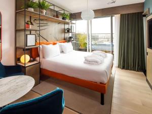 Postel nebo postele na pokoji v ubytování ibis Styles Edinburgh St Andrew Square