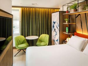 Postel nebo postele na pokoji v ubytování ibis Styles Edinburgh St Andrew Square