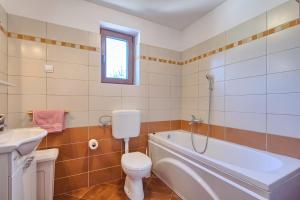 Koupelna v ubytování Holiday Home Tisa