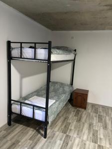 Ένα ή περισσότερα κρεβάτια σε δωμάτιο στο Hostel VANTA