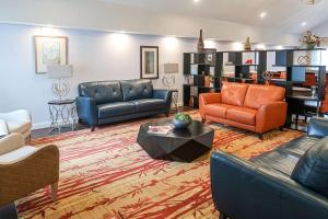 a large living room with couches and chairs at Tysons Corner Suites, A Baymont by Wyndham in Vienna