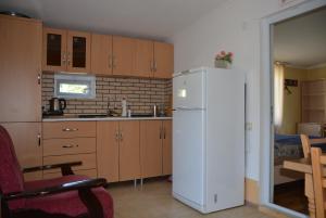 Kuchyň nebo kuchyňský kout v ubytování House in Mestia + 37 fotografií