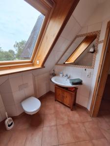 Koupelna v ubytování Ferienwohnung Land-Deern in Enge Nordfriesland + 8 fotografií