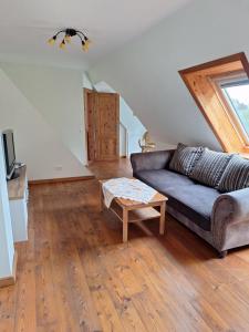 Posezení v ubytování Ferienwohnung Land-Deern in Enge Nordfriesland