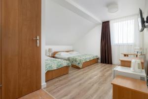 Postel nebo postele na pokoji v ubytování Paula