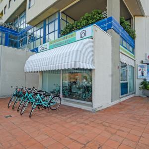a group of bikes parked outside of a building at Casa Alceo in Pesaro