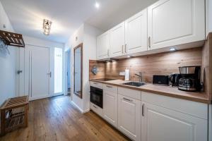 Köök või kööginurk majutusasutuses Möbliertes Wohnen - Margarete