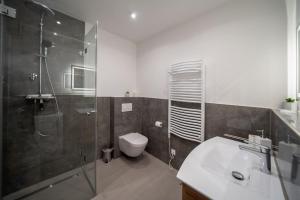 Vannituba majutusasutuses Möbliertes Wohnen - Margarete +2 fotot