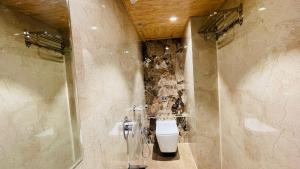 Koupelna v ubytování Hotel Arma Residency