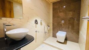 Koupelna v ubytování Hotel Arma Residency