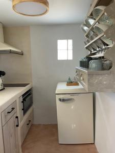 Kuchyň nebo kuchyňský kout v ubytování Metohi Luxury Home + 12 fotografií
