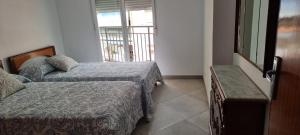 Postel nebo postele na pokoji v ubytování Habitación Doble a 100 m de la Playa