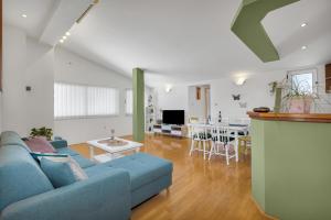 Televízia a/alebo spoločenská miestnosť v ubytovaní Apartman KLARA 2