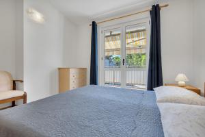 Posteľ alebo postele v izbe v ubytovaní Apartman KLARA 2